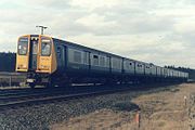 Class 507 in BR blue with Merseyrail logos, 1986