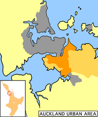 Manukau City (in orange) within the Auckland metropolitan area. The darker orange indicates the urban area.