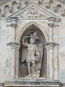 Statue of Saint Michael overlooking the entrance of the sanctuary.