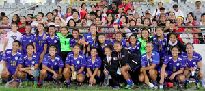 Philippine national team players in blue posing as a team