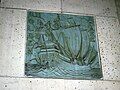 One of the tiles depicting maritime history