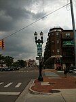 A reassurance marker at the corner of Michigan Avenue and Cedar Street