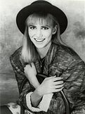 Black-and-white photo of Debbie Gibson smiling