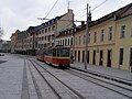 Kapucinska Street with T6A5 tram standing at the bus stop