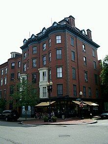 Five-story, red-brick corner building