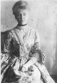 Huntington in her great great great Grandmother Elizabeth Pitkin's wedding dress, c. 1910[1]