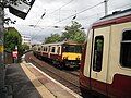 A Class 318 and 320 pass at Partick