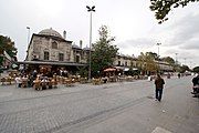 The Evvel Medrese, as seen from the market street on its east side. The domed chamber on the left corner is part of the mekteb (primary school).