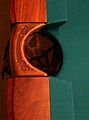 A view of one of the two side pockets of a pool table, showing the leather lattice that forms the pocket. (See "billiard table" for other table types.) A cropped, left-hand version of the image.