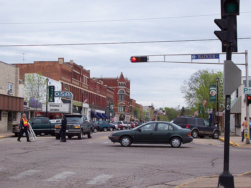 File:WaupacaWisconsinDowntownDuringSesquicentennial.jpg