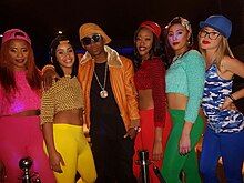 Khuli Chana, on a music video, set.alongside actress Chioma Umeala