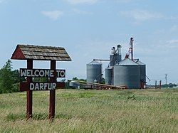 Town sign and grain elevator in Darfur, Minnesota