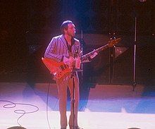 John Entwistle playing a bass guitar