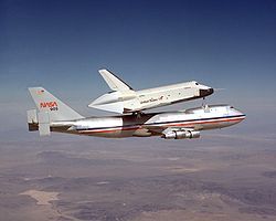 Space Shuttle Enterprise attached to Shuttle Carrier Aircraft during test flight