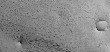 Field of small pits, as seen by HiRISE under HiWish program