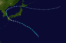 A track map showing the path of a typhoon over the western Pacific Ocean. The system initially moves northwestward and curves very gradually to the west-northwest. A shift back to the northwest brings the center of the storm over part of southwestern Japan and along the east coast of the Korean peninsula; from here, it turns to the east, crossing northern Japan and continuing out to sea.