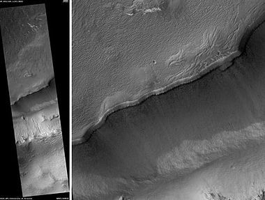 Maunder Crater, as seen by HiRISE. The overhang is part of the degraded south (toward bottom) wall of crater. The scale bar is 500 meters long.