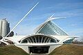 The Milwaukee Art Museum as viewed from the South displaying the brise soleil, cable-stayed bridge, and underground parking garage.