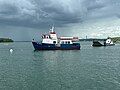 The Islander and barge moored off Chebeague Island in 2024