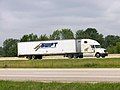 2005 Freightliner Columbia with a 1996 Wabash National 53' Sheet & Post Dry Van Trailer