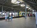 A train from Monumento station inside the Baclaran station of Manila Light Rail Transit (LRT) Line-1.