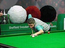 Cliff Thorburn playing snooker