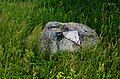 The stone with inscription: "Here was Jaugelka village"