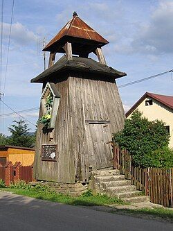 A wooden belfry in Szare