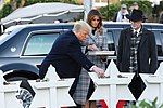 President Donald J. Trump and First Lady Melania Trump visit a memorial outside the Tree of Life Congregation Synagogue in Pittsburgh Tuesday, Oct. 30, 2018, placing flowers and stones in remembrance of the victims of Saturday's mass shooting.