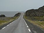 A road running next to the sea