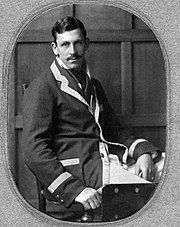 Portrait of Godwin Baynes as student at Cambridge, wearing jacket of Leander rowing club