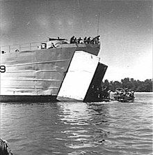 A landing ship disembarks troops