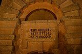 Inscription on the front side of the Laferla Cross shrine.