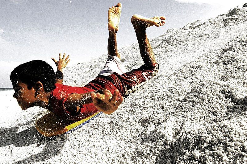 File:Sandboarding in maldives.jpg