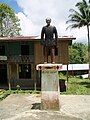 Statue of Mariano Datahan in Bohol, Philippines, early promoter of the Eskayan language and script, labeled in Eskayan with its unique script