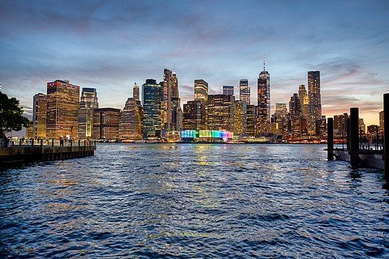 Financial District of Manhattan seen from the Brooklyn Bridge Park at the East River.