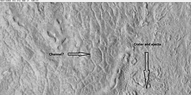 Close-up of surface near ejecta of crater, as seen by HiRISE under HiWish program. Melted ice from ground water may have formed small channel.