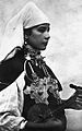 Image 1A Berber musician wearing two large triangular brooches in southern Morocco (early 20th century photo) (from Culture of Morocco)