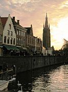 The Dijver canal and the tower of the Church of Our Lady.