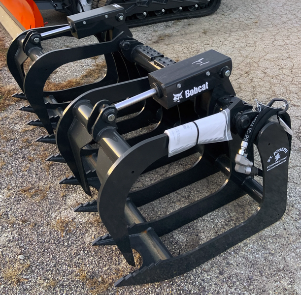 File:Skid steer grapple.webp