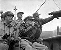 MacArthur observing the amphibious assault on Inchon during the Korean War