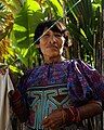 A Guna woman wearing a Mola