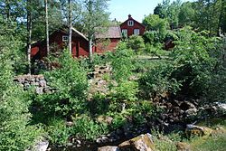 Wooden mill house of typical swedish construction.