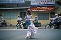 A female student wearing Áo dài, April 2002