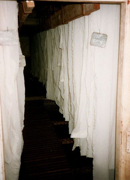 File:WhiteCrepeHangingInDryingShed.jpg