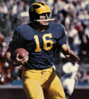 Fred Julian carrying the football for Michigan, 1959