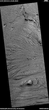 Fan with channels on its surface, as seen by HiRISE under HiWish program