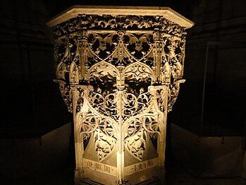 The baptismal font by Jost Dotzinger (1453)