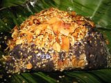 Htamanè – glutinous rice with fried coconut, roasted peanuts, sesame and ginger