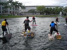 Students "walking" across a lake on various homemade setups